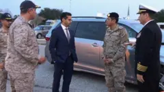 Saudi Arabia's defense attache met with students confined to the Florida base last month