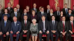 Leaders of Nato alliance countries, and its secretary general, join Britain's Queen Elizabeth and the Prince of Wales
