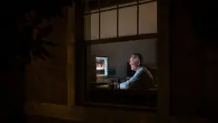 a man laughing