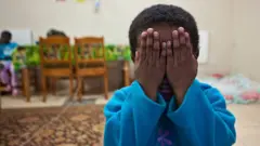 Nwata kpuchiri anya ya