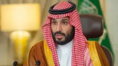 Saudi Crown Prince Mohammed bin Salman gives a speech from his office as he addresses the Saudi Green Initiative forum opening ceremony, in Riyadh, Saudi Arabia, October 23, 2021