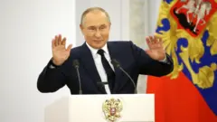 путін