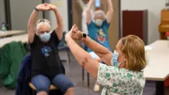 women at the exercise class