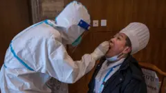 ежедневное тестирование проходит шеф-повар олимпийской гостиницы в Пекине