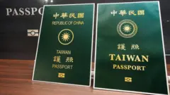Taiwan unveils its new passport, right, which has the word Taiwan larger and the words Republic of China smaller