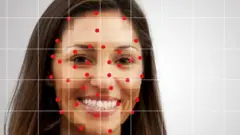 A woman being checked by a facial recognition system