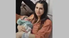 తిలో పసివాడు యాగిజ్‌తో నెక్లా