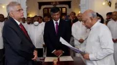 අන්තර්කාලීන ආණ්ඩුවේ අමාත්‍යවරු 18 දෙනා කවුරුන්ද?