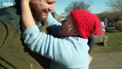 Ukrainian soldier hugging his relative