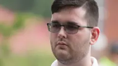 James Alex Fields Jr is seen attending the "Unite the Right" rally in Emancipation Park before being arrested by police on 12 August, 2017