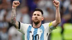 Lionel Messi (centre)