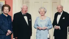 Queen Elizabeth II stands with (from left), Prime Minister Tony Blair and former Prime Ministers Margaret Thatcher, Ted Heath, James Callaghan and John Major in Downing Street Monday April 29, 2002