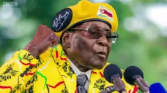 MUGABE