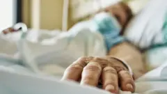 Patient in a hospital bed