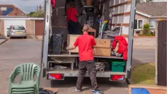 MOVING HOUSES