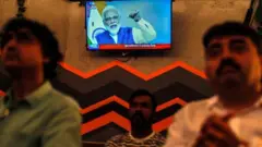 టీవీలో మోదీ