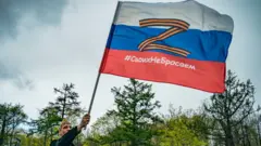 Росія