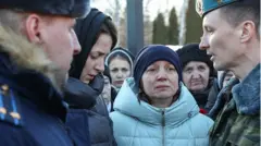 Sergeant Ilnur Sibgatullin's widow and mother during a mourning ceremony at Victory Monument Square. Sibgatullin, 2 March 2022