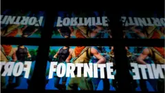 This illustration picture shows the video game Fortnite logo displayed on a tablet in Paris, on February 18, 2019