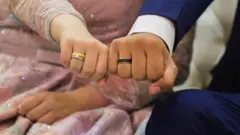 مرأة وزوجها
