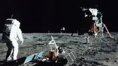 Buzz Aldrin walking on the Moon