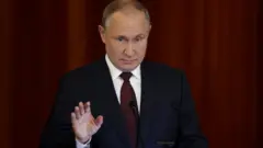 Путин