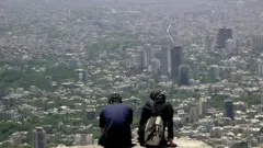 زن