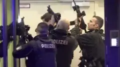 Police enter building in Hamburg after shooting