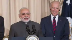 நரேந்திர மோதி மற்றும் ஜோ பைடன்