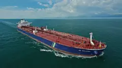 A Singapore-flagged oil tanker has been hit by an unidentified "external source"