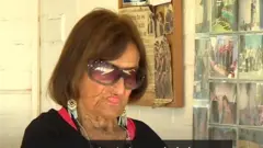 يوه نڅاګره چې عمر يې نژدې سلو کلونو ته رسېږي، له خپلو مهارتونو ګټه اخلي چې د بريتانيا د ملي روغتيا خدمتونو ته پيسې راټولې کړي.