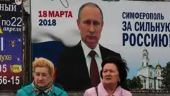 путін