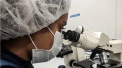 Heydi Contreras works on the development and production of the Soberana II vaccine against Covid-19 in a laboratory of the Finlay Institute in Havana, Cuba, 20 January 2021.