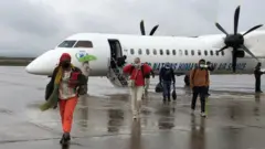 ሐምሌ አጋማሽ ላይ የረድኤት ድርጅት ሠራተኖች በሰብዓዊ እርዳታ በረራ በትግራይ መዲና መቀለ በደረሱ ጊዜ