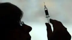 Woman with syringe