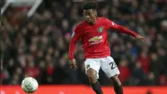 Angel Gomes in action