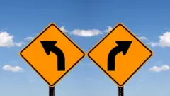 ወደተለያየ አቅጣጫ የሚያሳይ ምልክት