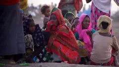 ስደተኛታት