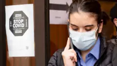 Spanish woman wearing mask on 4 December 2021 in Valencia