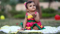 બાળકી