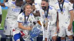 Luka Modric (left)
