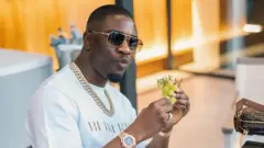 Olalekan Jacob Ponle wey pipo also know as Woodberry one of di internet fraudster Dubai police arrest