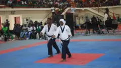 Aminat Idris ati akẹẹgbẹ rẹ, Arowora Roqeeb