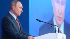 Russian President Vladimir Putin attends a convention of the Russian Union of Industrialists and Entrepreneurs (RSPP) in Moscow, Russia, on 17 December 2021