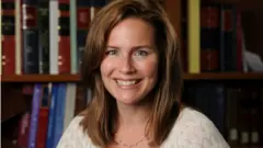 Judge Amy Coney Barrett poses in an undated photograph obtained from Notre Dame University