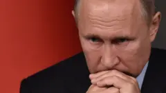 Путін