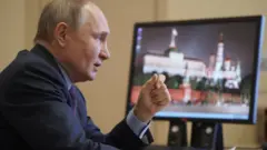 Путин