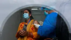 कोभिड खोप