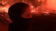 Eduarda em meio a incêndio