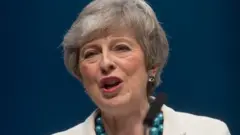 Theresa May
